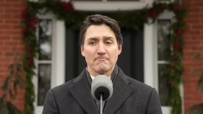 Canada Prime Minister Justin Trudeau makes an announcement outside Rideau Cottage in Ottawa on Monday, Jan. 6, 2025. (Adrian Wyld/The Canadian Press via AP)