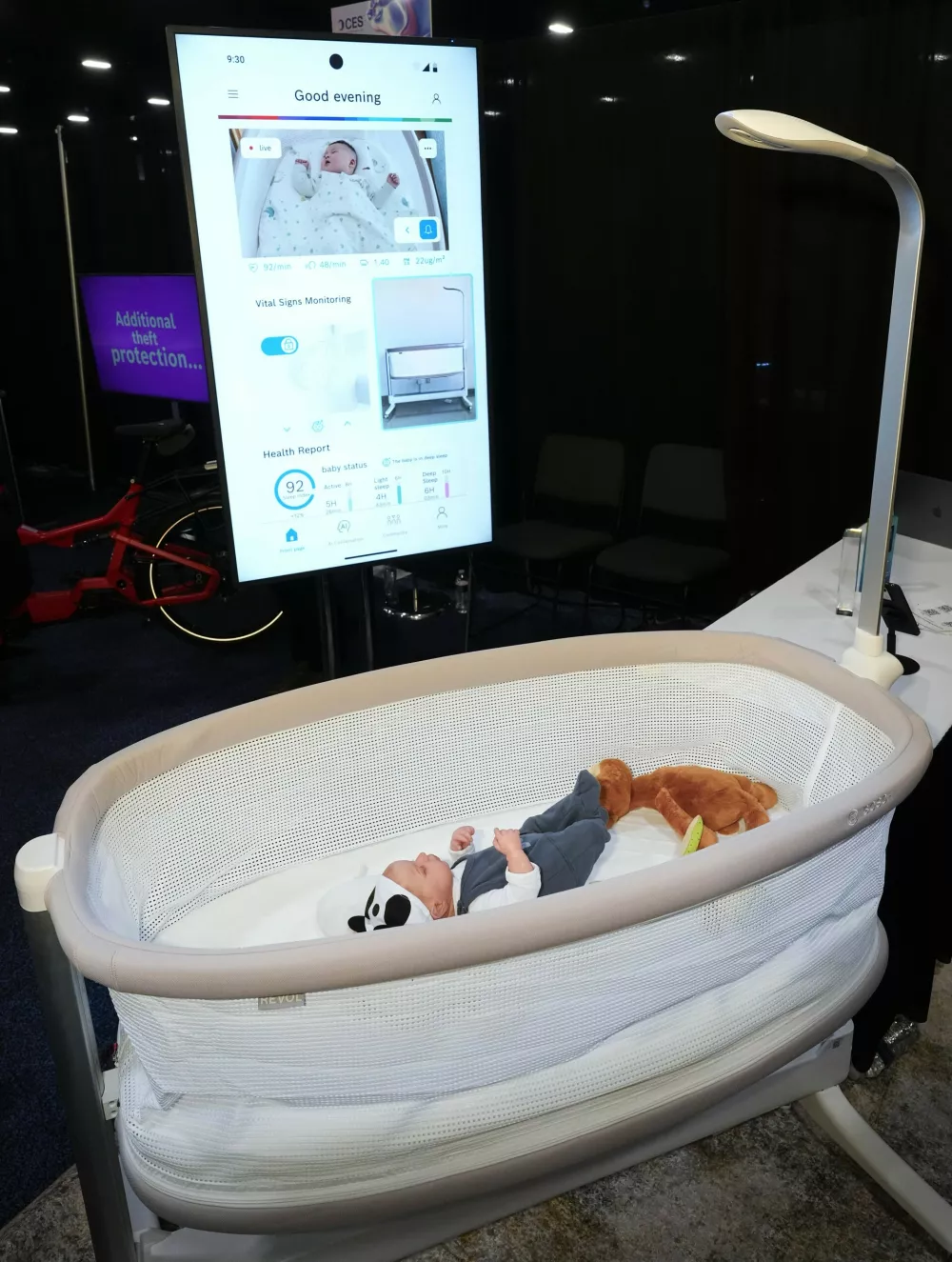 Bosch showcases the Revol Intelligent Crib, which monitors the baby's vital signs and can automatically rock if the baby is crying, during 2025 CES Unveiled, Sunday, Jan. 5, 2025, in Las Vegas. (AP Photo/Jack Dempsey)