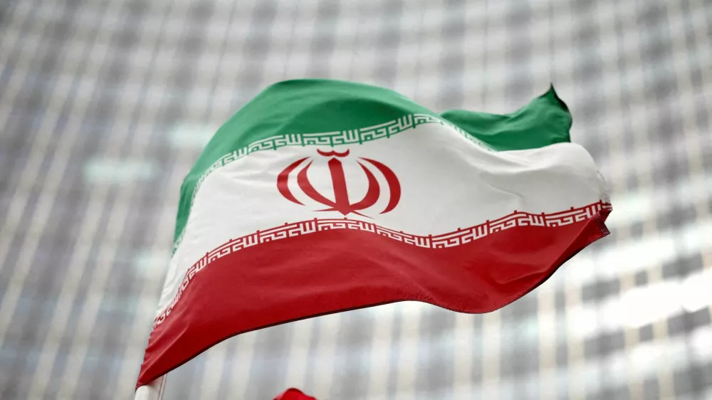 FILE PHOTO: Iranian flag flies in front of the UN office building, housing IAEA headquarters, amid the coronavirus disease (COVID-19) pandemic, in Vienna, Austria, May 24, 2021. REUTERS/Lisi Niesner//File Photo