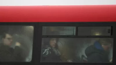 Commuters sit on a bus as it rains during the morning rush-hour in London, Britain, January 6, 2025. REUTERS/Toby Melville   TPX IMAGES OF THE DAY