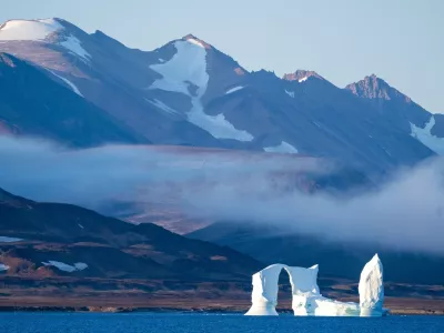 FILE - An iceberg floats in the Scoresby Sund, on Sept. 12, 2023, in Greenland. (AP Photo/Chris Szagola, File)