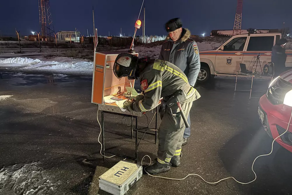 In this photo released by Governor of the Saratov region Roman Busargin telegram channel on Wednesday, Jan. 8, 2025, Firefighters and rescuers work at the industrial side damaged after Ukrainian drones' attack in Saratov, Russia. (Governor of the Saratov region Roman Busargin telegram channel via AP)