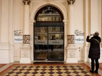  SENSITIVE MATERIAL. THIS IMAGE MAY OFFEND OR DISTURB  The entrance of the main building of the People's Party is coated with text that reads "you smell like brown shit" during a press statement of the head of People's Party Christian Stocker in Vienna, Austria, January 8, 2025 REUTERS/Lisa Leutner