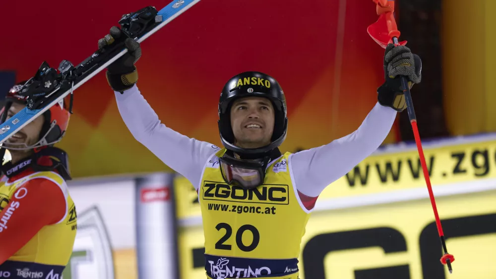 Bulgaria's Albert Popov celebrates winning an alpine ski, men's World Cup slalom in Madonna di Campiglio, Italy, Wednesday, Jan.8, 2025. (AP Photo/Alessandro Trovati)