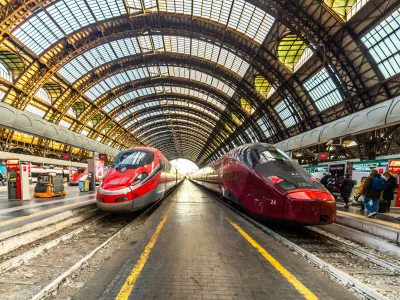 R9214C MILANO, ITALY - DECEMBER 12, 2018: TRENITALIA FRECCIAROSSA and NTV ITALO trains waiting at Milano Centrale station