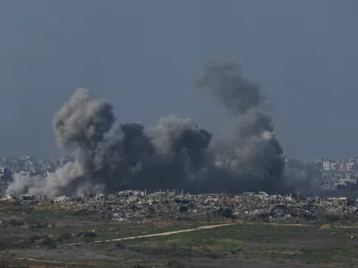 Smoke billows following an air strike, as buildings lie in ruin in Beit Hanoun, in the Gaza Strip, amid the ongoing conflict between Israel and Hamas, as seen from southern Israel, January 12, 2025. REUTERS/Kai Pfaffenbach