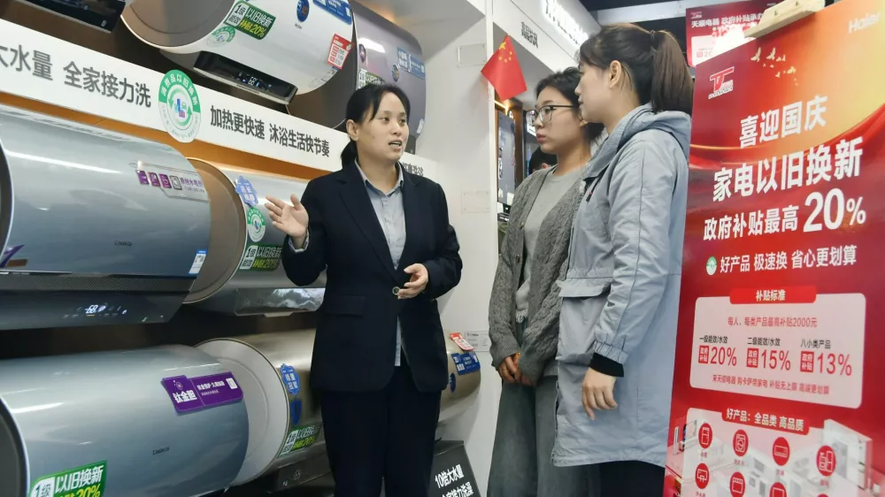 Consumers buy water heaters at an appliance trade-in promotion event in Handan, China, on October 7, 2024. (Photo by Costfoto/NurPhoto)NO USE FRANCE