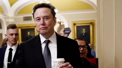 FILE PHOTO: Elon Musk walks on Capitol Hill on the day of a meeting with Senate Republican Leader-elect John Thune (R-SD), in Washington, U.S. December 5, 2024. REUTERS/Benoit Tessier/File Photo