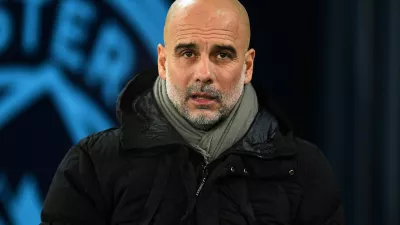 FILE PHOTO: Soccer Football - FA Cup - Third Round - Manchester City v Salford City - Etihad Stadium, Manchester, Britain - January 11, 2025 Manchester City manager Pep Guardiola before the match REUTERS/Peter Powell/File Photo