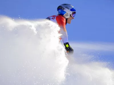 Switzerland's Marco Odermatt checks his time at the finish area of an alpine ski, men's World Cup downhill, in Wengen, Switzerland, Saturday, Jan. 18, 2025 (AP Photo/Giovanni Maria Pizzato)