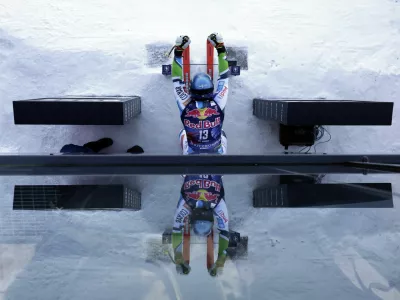 Alpine Skiing - FIS Alpine Ski World Cup - Men's Downhill Training - Kitzbuehel, Austria - January 22, 2025 Slovenia's Miha Hrobat reflection is seen on the starting house during training REUTERS/Leonhard Foeger