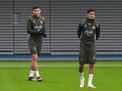 21 January 2025, United Kingdom, Manchester: Manchester City's Abdukodir Khusanov (L) and Vitor Reis in action during a training session at the City Football Academy. Photo: Martin Rickett/PA Wire/dpa