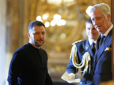 Belgium's King Philippe, right, meets with Ukraine's President Volodymyr Zelenskyy at the Royal Palace in Brussels, Thursday, March 6, 2025. (AP Photo/Geert Vanden Wijngaert, Pool)