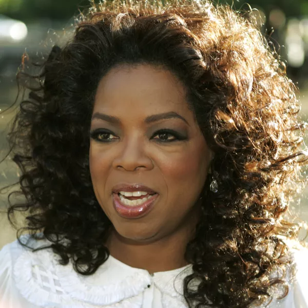 FILE - In this June 25, 2008 file photo, U.S. television presenter Oprah Winfrey arrives for the dinner birthday party of former president of South Africa Nelson Mandela in central London's Hyde Park. Winfrey has settled a defamation lawsuit filed by the ex-headmistress of her girls school in South Africa, lawyers said Tuesday March 23, 2010. The lawsuit by former headmistress Nomvuyo Mzamane claimed Winfrey defamed her in remarks made in the wake of a 2007 sex-abuse scandal at the school. (AP Photo/Lefteris Pitarakis, File)