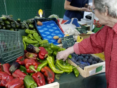 AKTWB8 Perpignan France, Small Local neighborhood grocery store vegetables on Sidewalk in Center of Old City Senior Woman Buying Food, shopper choosing,