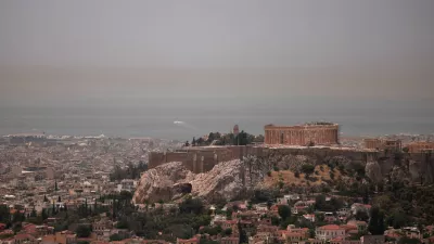 A view of the Parthenon temple as the Acropolis hill archaeological site is closed to visitors, with Saharan dust blanketing the city during a heatwave in Athens, Greece, June 13, 2024. REUTERS/Alkis Konstantinidis