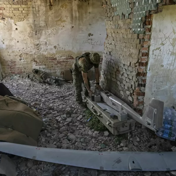 A Ukrainian serviceman of the 148th Separate Artillery Brigade of the Ukrainian Air Assault Forces, assembles an American reconnaissance drone RQ-20 «Puma» for flying over positions of Russian troops, amid Russia's attack on Ukraine, in Donetsk region, Ukraine June 13, 2024. REUTERS/Stringer