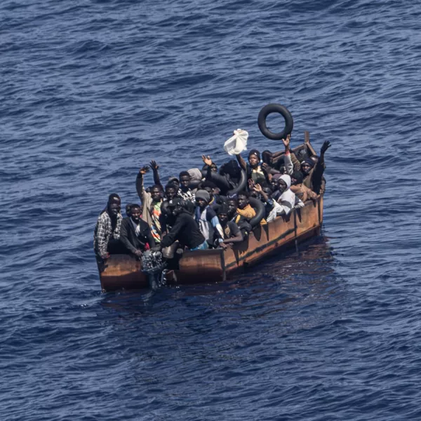 PRODUCTION - 29 June 2023, Italy, Lampedusa: Migrants trying to reach the Italian island of Lampedusa from the northern coast of Africa are apparently adrift in the Mediterranean Sea with engine trouble. More and more African refugees are crossing to Italy from Tunisia. Many migrants pay a high price for the journey, not only financially. Photo: Oliver Weiken/dpa