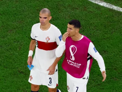 Soccer Football - FIFA World Cup Qatar 2022 - Group H - South Korea v Portugal - Education City Stadium, Al Rayyan, Qatar - December 2, 2022 Portugal's Cristiano Ronaldo and Pepe react after the match REUTERS/Fabrizio Bensch