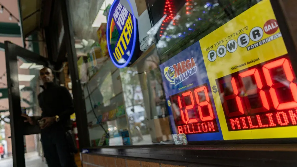 A digital billboard advertising Mega Millions Jackpot of 1.28 billion dollars is displayed in New York City, U.S., July 29, 2022. REUTERS/Jeenah Moon