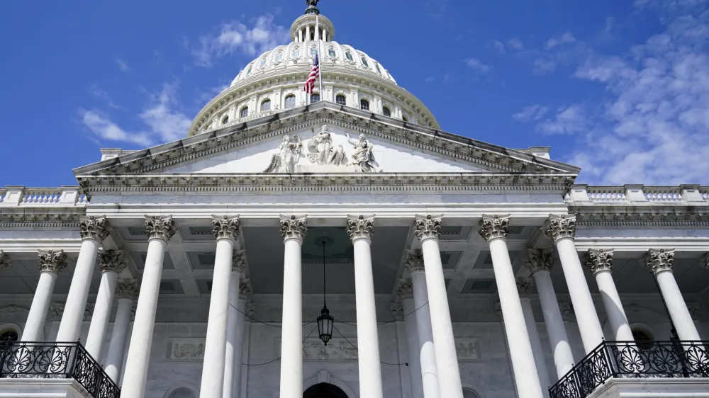 FILE - The U.S. Capitol in Washington is pictured on Friday, August 5, 2022. Democrats pushed their election-year economic package to Senate passage Sunday, Aug. 7, 2022, a compromise less ambitious than Biden's original domestic vision but one that still meets party goals of slowing global warming, moderating pharmaceutical costs and taxing immense corporations. (AP Photo/Mariam Zuhaib, File)