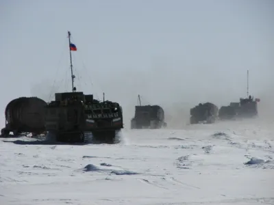 A supply convoy arrives at the Vostock research camp in Antarctica in this December 2009 handout photograph. Russian scientists are close to drilling into the prehistoric sub-glacier Lake Vostok, which has been trapped under Antarctic ice for 14 million years. Picture taken in December 2009. REUTERS/Alexey Ekaikin/Handout (ANTARCTICA - Tags: SCIENCE TECHNOLOGY) FOR EDITORIAL USE ONLY. NOT FOR SALE FOR MARKETING OR ADVERTISING CAMPAIGNS. THIS IMAGE HAS BEEN SUPPLIED BY A THIRD PARTY. IT IS DISTRIBUTED, EXACTLY AS RECEIVED BY REUTERS, AS A SERVICE TO CLIENTS