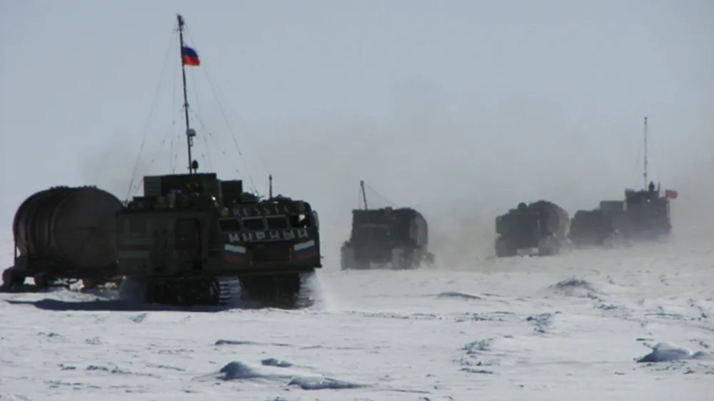 A supply convoy arrives at the Vostock research camp in Antarctica in this December 2009 handout photograph. Russian scientists are close to drilling into the prehistoric sub-glacier Lake Vostok, which has been trapped under Antarctic ice for 14 million years. Picture taken in December 2009. REUTERS/Alexey Ekaikin/Handout (ANTARCTICA - Tags: SCIENCE TECHNOLOGY) FOR EDITORIAL USE ONLY. NOT FOR SALE FOR MARKETING OR ADVERTISING CAMPAIGNS. THIS IMAGE HAS BEEN SUPPLIED BY A THIRD PARTY. IT IS DISTRIBUTED, EXACTLY AS RECEIVED BY REUTERS, AS A SERVICE TO CLIENTS