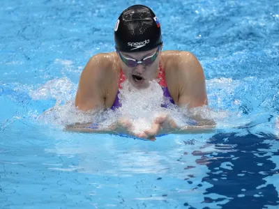 Katja Fain, of Slovenia, swims in a heat for the women's 400-meter Individual medley at the 2020 Summer Olympics, Saturday, July 24, 2021, in Tokyo, Japan. (AP Photo/Charlie Riedel)