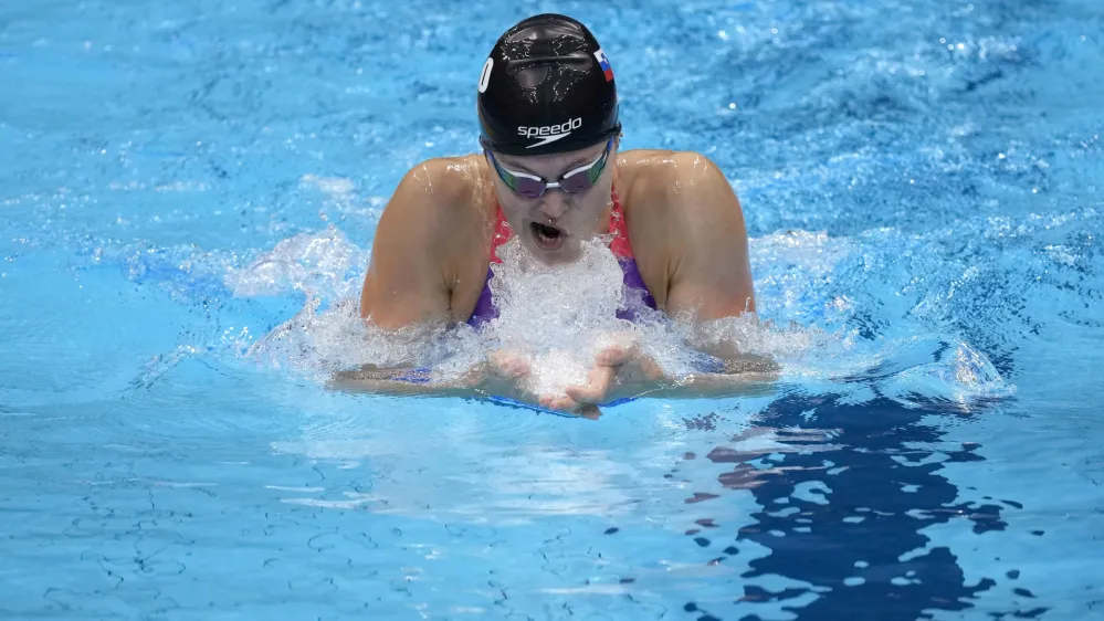 Katja Fain, of Slovenia, swims in a heat for the women's 400-meter Individual medley at the 2020 Summer Olympics, Saturday, July 24, 2021, in Tokyo, Japan. (AP Photo/Charlie Riedel)