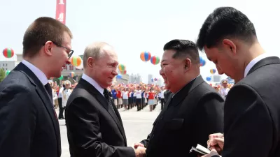 HANDOUT - 19 June 2024, North Korea, Pyongyang: North Korean leader Kim Jong-un and Russian President Vladimir Putin attend a welcoming ceremony at Kim Il Sung Square. Photo: -/Kremlin/dpa - ATTENTION: editorial use only and only if the credit mentioned above is referenced in full