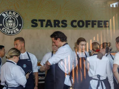 Staff members get ready for the launching of the new coffee shop "Stars Coffee", which opens following Starbucks Corp company's exit from the Russian market, in Moscow, Russia August 18, 2022. REUTERS/Maxim Shemetov   TPX IMAGES OF THE DAY