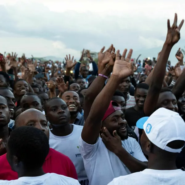 Supporters of political parties belonging to the Ensemble coalition cheer during Congolese presidential candidate's, Moise Katumbi's, campaign rally at the Afia stadium in Goma, North Kivu province, Democratic Republic of the Congo November 23, 2023. REUTERS/Arlette Bashizi