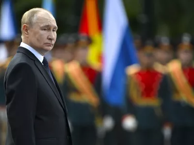 Russian President Vladimir Putin attends a wreath laying ceremony at the Tomb of Unknown Soldier near the Kremlin Wall in Moscow, Russia, on Saturday, June 22, 2024, marking the 83rd anniversary of the Nazi invasion of the Soviet Union and on the Day of Memory and Sorrow. (Sergei Guneyev, Sputnik, Kremlin Pool Photo via AP)