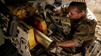 A serviceman of the 24th Mechanized brigade named after King Danylo of the Ukrainian Armed Forces loads a shell inside a 2S1 Gvozdika self-propelled howitzer while firing towards Russian troops in a front line, amid Russia's attack on Ukraine, near the town of Chasiv Yar in Donetsk region, Ukraine June 22, 2024. Oleg Petrasiuk/Press Service of the 24th King Danylo Separate Mechanized Brigade of the Ukrainian Armed Forces/Handout via REUTERS ATTENTION EDITORS - THIS IMAGE HAS BEEN SUPPLIED BY A THIRD PARTY.