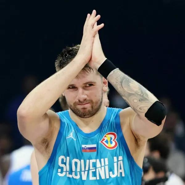 Basketball - FIBA World Cup 2023 - Classification Games 7-8 - Italy v Slovenia - Mall of Asia Arena, Manila, Philippines - September 9, 2023 Slovenia's Luka Doncic applauds fans after the match REUTERS/Eloisa Lopez