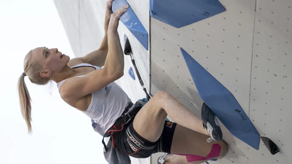 Janja Garnbret from Slovenia competes to win the women's sport climbing lead final at the European Sport Climbing Championships in Munich, Germany, Saturday, Aug. 13, 2022. (Sven Hoppe/dpa via AP)