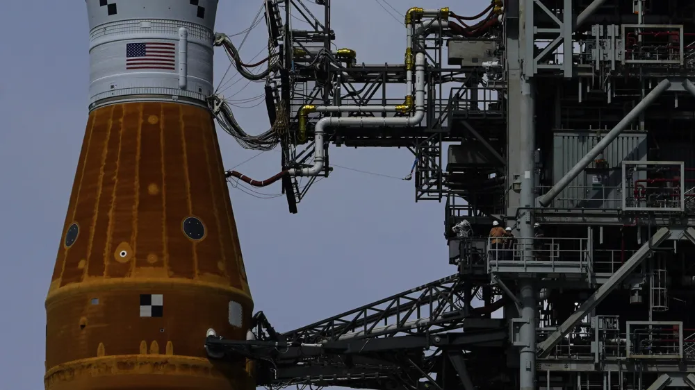 The NASA moon rocket stands on Pad 39B before the Artemis 1 mission to orbit the moon at the Kennedy Space Center, Friday, Sept. 2, 2022, in Cape Canaveral, Fla. (AP Photo/Brynn Anderson)