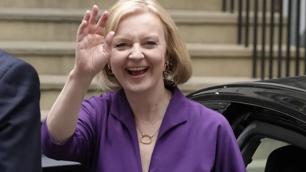 FILE - Liz Truss arrives at Conservative Central Office in Westminster after winning the Conservative Party leadership contest in London, Monday, Sept. 5, 2022. Liz Truss will become Britain's new Prime Minister after an audience with Britain's Queen Elizabeth II on Tuesday Sept. 6. (AP Photo/Kirsty Wigglesworth, File)