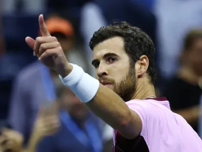 Tennis - U.S. Open - Flushing Meadows, New York, United States - September 7, 2022 Russia's Karen Khachanov celebrates after winning his quarter final match against Australia's Nick Kyrgios REUTERS/Mike Segar