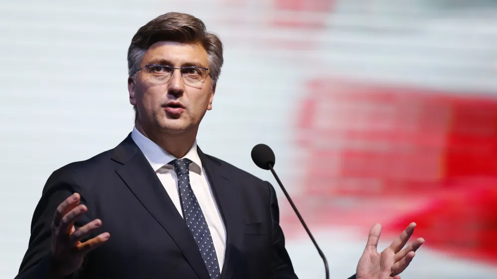 Croatia's Prime Minister Andrej Plenkovic delivers his speech during a political rally of the Croatian Democratic Union of Bosnia and Herzegovina in Mostar, Bosnia, on Thursday, Oct. 4, 2018. Bosnia holds a general election this weekend that could cement ethnic divisions of the 1992-95 war as a pro-Russian nationalist bids for a top post and politicians cling to war-era rivalries rather than reform needed to pull the country out of the post-war limbo. (AP Photo/Amel Emric)