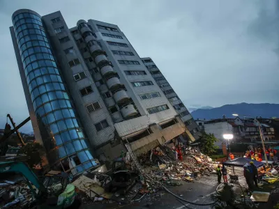 epaselect epa06502253 Rescue services search for people in a damaged building in Hualien, eastern Taiwan, 07 February 2018, after a magnitude 6.4 earthquake hit Hualien on the night of 06 February 2018. Media reports said several buildings were damaged and at least four people were killed and some 100 were injured during the quake. Rescue teams are trying to rescue people inside the buildings. Some bridges and roads are damaged and the main road to Hualien, the Suhua Highway (Suao to Hualien Highway) is closed. More than 100 earthquakes have hit off Taiwan's east coast in the past three days. The Seismological Observation Center said they are cuased by the friction between the Philipine Plate and Eurasian Plate. EPA-EFE/RITCHIE B. TONGO