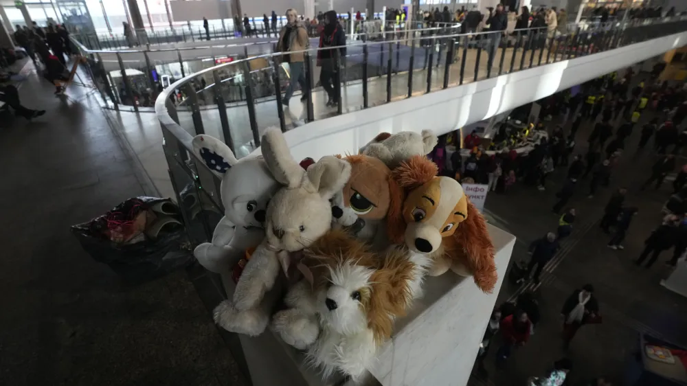 Soft toys are provided for children, who have fled Ukraine, at the train station in Warsaw, Poland, Sunday, March 13, 2022. More than 1.5 million refugees have arrived in Poland since the start of Russia's invasion of Ukraine on Feb. 24, out of a total of around 2.7 million people that the United Nations say have fled so far. (AP Photo/Czarek Sokolowski)