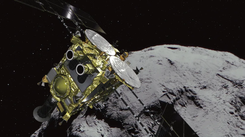 ﻿This computer graphics image provided by the Japan Aerospace Exploration Agency (JAXA) shows an asteroid and asteroid explorer Hayabusa2. The Japanese space explorer that will try to blow a crater in an asteroid and bring back samples from inside is nearing its destination after a 3 1/2 -year journey. The unmanned Hayabusa2 has arrived at the asteroid Wednesday, June 27, 2018, about 280 million kilometers (170 million miles) from Earth.(JAXA via AP)