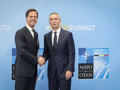 FILED - 11 July 2018, Belgium, Brussels: Mark Rutte, Netherlands Prime Minister, is welcomed by Nato Secretary General Jens Stoltenberg (R) at the start of the NATO Summit. Photo: Pool Sebastien Pirlet/BELGA/dpa