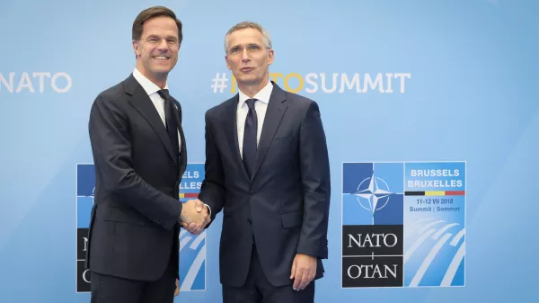 FILED - 11 July 2018, Belgium, Brussels: Mark Rutte, Netherlands Prime Minister, is welcomed by Nato Secretary General Jens Stoltenberg (R) at the start of the NATO Summit. Photo: Pool Sebastien Pirlet/BELGA/dpa