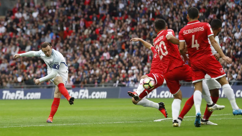 ﻿Football Soccer Britain - England v Malta - 2018 World Cup Qualifying European Zone - Group F - Wembley Stadium, London, England - 8/10/16<br>England's Wayne Rooney shoots at goal<br>Action Images via Reuters / Carl Recine<br>Livepic<br>EDITORIAL USE ONLY.