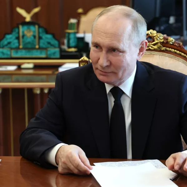 Russian President Vladimir Putin speaks to Vladimir Saldo, the Moscow-appointed head of the Russian-controlled Kherson region of Ukraine, during their meeting at the Kremlin in Moscow, Russia, Tuesday, June 25, 2024. (Vyacheslav Prokofyev, Sputnik, Kremlin Pool Photo via AP)