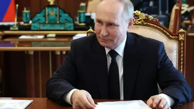 Russian President Vladimir Putin speaks to Vladimir Saldo, the Moscow-appointed head of the Russian-controlled Kherson region of Ukraine, during their meeting at the Kremlin in Moscow, Russia, Tuesday, June 25, 2024. (Vyacheslav Prokofyev, Sputnik, Kremlin Pool Photo via AP)