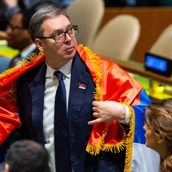 Serbian President Aleksandar Vucic wears Serbia's flag after voting in the United Nations General Assembly on the creation of an international day to commemorate the Srebrenica genocide, at the UN Headquarters in New York City, U.S. May 23, 2024. REUTERS/Eduardo Munoz