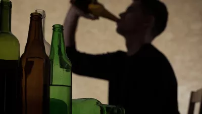 Alcoholism among young people - teenager drinking beer